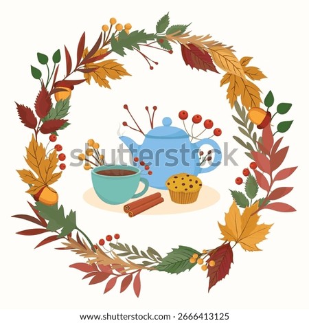 Autumn tea set with fall plants and leaves arranged in a wreath with tea cup, kettle and cinnamon for seasonal decoration and design