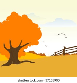 Autumn tree in meadow