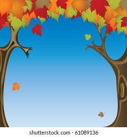 Autumn trees on a blue graduated sky