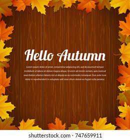 Autumn typography poster with colored leaves and wooden background. Vector illustration