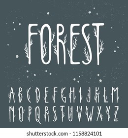 Autumn vector alphabet. Uppercase letters decorated with tree branches.