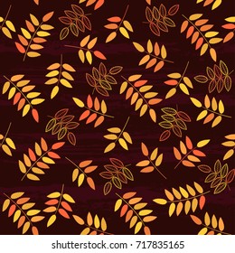 Autumn vector background. Seamless vector pattern with colored leaves.