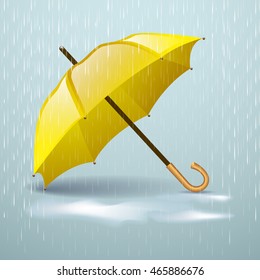 Autumn vector background with yellow umbrella in the rain and  puddles