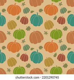 Autumn vector pattern. Seamless harvest background with colorful silhouettes of pumpkins and fall leaves. Hand drawn Thanksgiving and autumn season symbols.