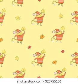 Autumn vector seamless pattern with cute cartoon cats in caps and  leaves on a yellow background.
