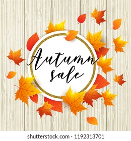 Autumn vector wooden background with orange maple leaves. Abstract round golden banner for seasonal fall sale. 