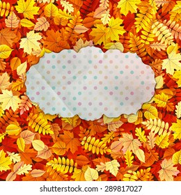 Autumn vintage greeting card on colorful leaves background with copy space. EPS 10 vector file included