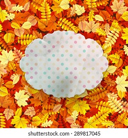 Autumn vintage greeting card on colorful leaves background with copy space. EPS 10 vector file included