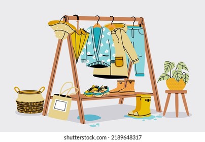 Armario de otoño. Coger ropa de temporada colgando de las barandillas de percha, ropa acogedora casual zapatos de abrigo. Vector de ropa de invierno cálido en racks ilustración del armario para , ilustración del clima otoñal