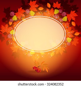 The autumn wedding invitation. On the background autumn leaves are visible. On the top can be seen leaves of maple and aspen.