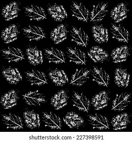 Autumn white and black seamless leaf pattern. Decorative template texture with imprinted leaves. Vector.