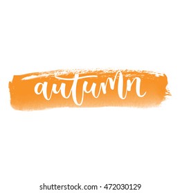 Autumn white hand written inscription on orange banner watercolor background