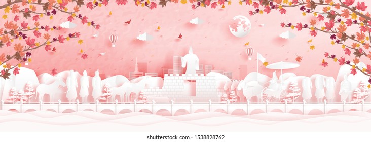 Autumn in Xian, China with falling maple leaves and world famous landmarks in paper cut style vector illustration