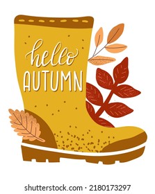 Autumn yellow rubber boots on a white background. Lettering "Hello autumn". Leaf fall and fall weather. waterproof shoes