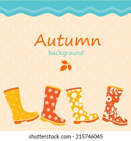 Autumnal background with colorful gumboots