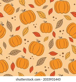 Autumnal seamless pattern -pumpkins and leaves vector design.