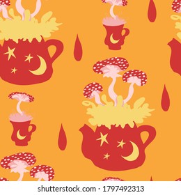 Autumnal vector seamless pattern with magic mushrooms in kettles and cups in cozy warm colors on orange background with red drops