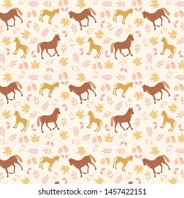Autumn/fall leaves and horses seamless vector pattern. Hand drawn animal pattern.