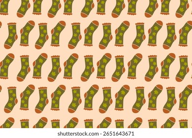 Padrão sem costura com tema de outono com meias de lã verde decoradas com bolotas