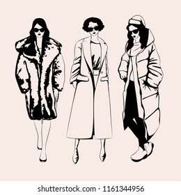 Autumn-Winter Coats Trend 2018/2019. Three women posing. Fashion sketch. Vector illustration. Eps 10.