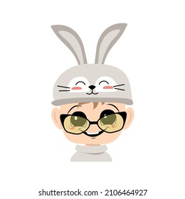 Avatar of boy with big eyes and wide happy smile in cute rabbit hat with glasses. Head of child with joyful face for holiday Easter, New Year or carnival costume for party. Vector flat illustration