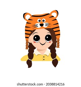Avatar of a girl with big eyes and a wide smile in a tiger hat. Cute kid with a joyful face in a festive costume for New Year, Christmas and holiday. Head of adorable child with happy emotions