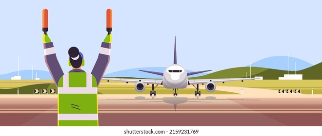 aviation marshaller navigate with light sticks air traffic controller airline worker in signal vest professional airport staff