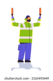 aviation marshaller supervisor signaling near aircraft air traffic controller airline worker in signal vest professional airport staff