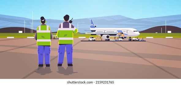 aviation marshallers supervisors in uniform using walkie talkie air traffic controllers airline worker in signal vests professional airport staff