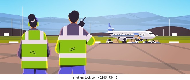 aviation marshallers supervisors in uniform using walkie talkie air traffic controllers airline worker in signal vests professional airport staff