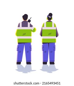 aviation marshallers in uniform using walkie talkie air traffic controllers airline worker in signal vests professional airport staff