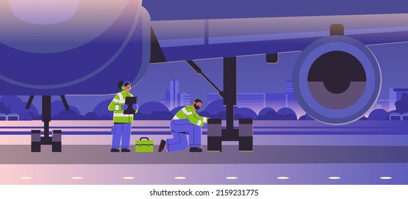 aviation supervisors mechanic and marshal in signal vests engineers checking aircraft landing gear wheel professional airport staff