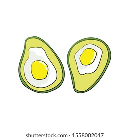 The avocado halves with a fried egg inside. Healthy breakfast.