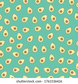 Avocado halves on turquoise background, vector seamless pattern. Creative fruit textile, wrapping paper, wallpaper design