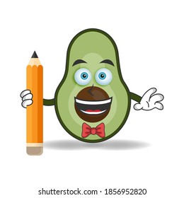 Avocado mascot character holding a pencil. vector illustration