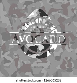 Avocado on grey camo texture