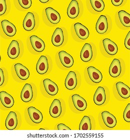 Aguacates colocados uno al lado del otro sobre un fondo amarillo