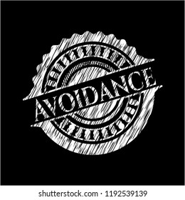 Avoidance written on a chalkboard