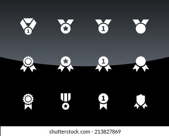 Awards and medal icons on black background. Vector illustration.