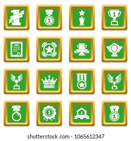 Awards medals cups icons set vector green square isolated on white background 