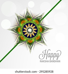 A awesome greeting card for Indian festival Raksha Bandhan background with beautiful rakhi.