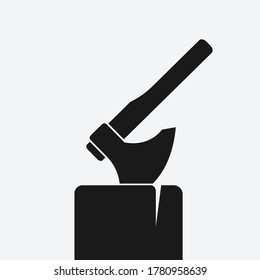 Axe in log black silhouette on white background