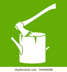 Axe stuck in a tree stump icon white isolated on green background. Vector illustration