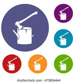 Axe stuck in a tree stump icons set in flat circle reb, blue and green color for web