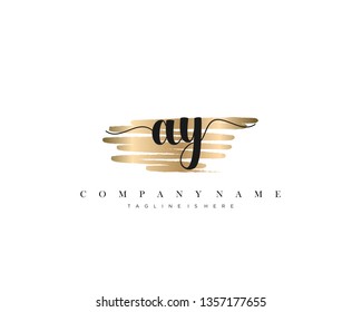 AY initial handwriting logo with brush gold color template vector