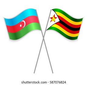 Azerbaijani and Zimbabwean crossed flags. Azerbaijan combined with Zimbabwe isolated on white. Language learning, international business or travel concept.