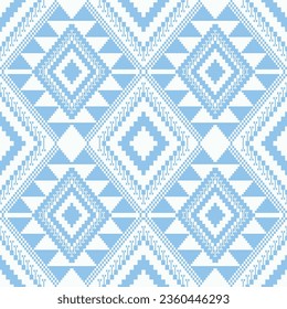 Aztec blue-white geometric pattern. Vector aztec geometric shape seamless pattern cross stitch style. Ethnic geometric stitch pattern use for textile, wallpaper, cushion, carpet, rug, upholstery, etc