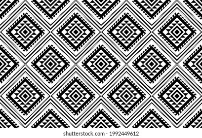 Aztec ethnic geometric seamless pattern design. Ikat fabric carpet mandala ornament native boho chevron textile decoration. Ethnic patterns embroidery African American Indian style vector illustration