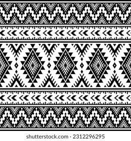 Aztec geometric seamless ethnic pattern. Folk monochrome style. Template print for textile design, fabric, clothes, curtain, carpet, batik, ornament, wallpaper, background, wrapping, paper.