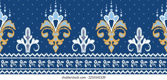 Aztec Ikat paisley embroidery on blue background.geometric ethnic oriental seamless pattern traditional.African style abstract vector.design for texture,fabric,clothing,saree,decoration,sari.